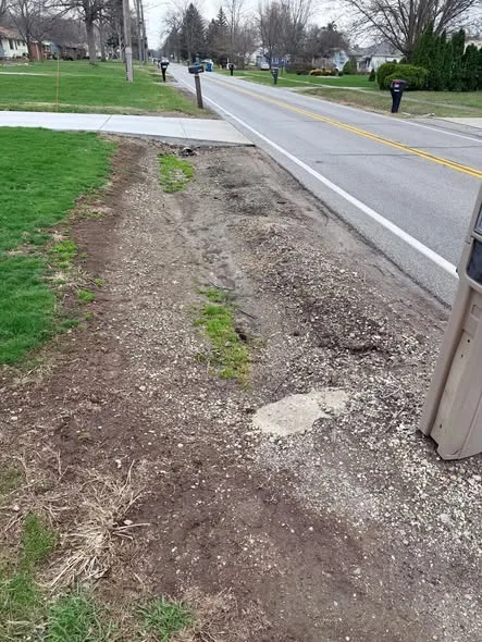 Sewer work with the yard restored to grass